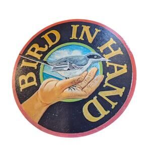Montage Louis A. Laferriere Bird In Hand Round Wood Artwork